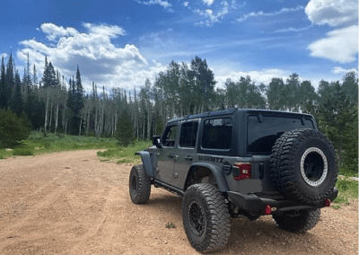 Jeep Parked at look out point on road to Mirror Lake in Utah.